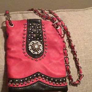 Small pink and black leather purse.